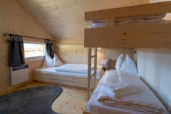 Chalet Dahoam Schlafzimmer, Foto: Tom Lamm