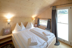 Chalet Dahoam Schlafzimmer, Foto: Tom Lamm