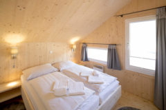 Chalet Griass di Schlafzimmer, Foto: Tom Lamm